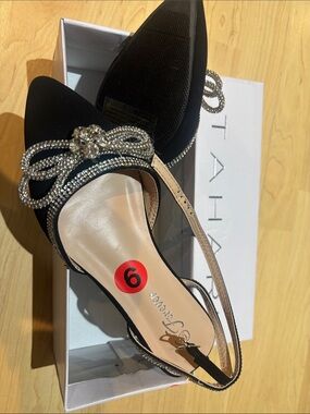 Forever Unique Black Pointed Slingback Flats with Crystal Bow